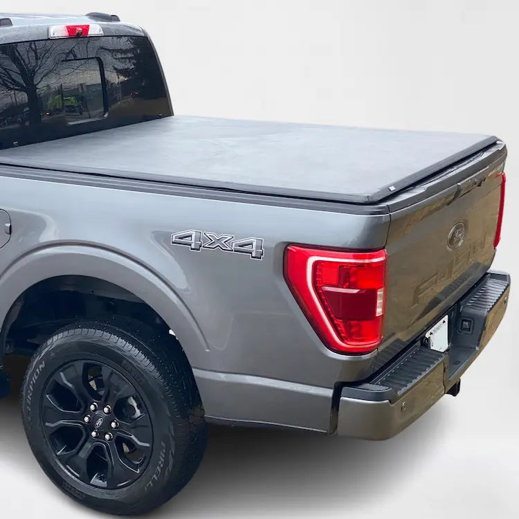 teamz soft tri-fold tonneau cover rear light view